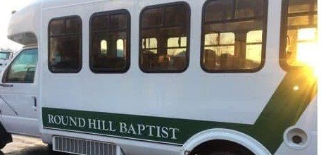 The same shuttle bus after washing, bright white