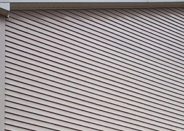 The same vinyl siding clean and even after a soft wash