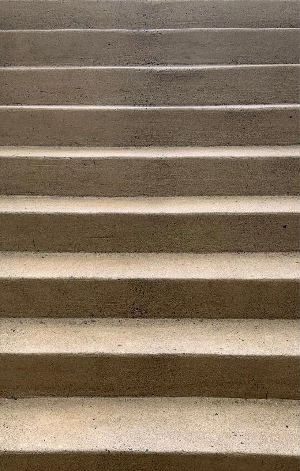 The same concrete steps clean and light tan after washing