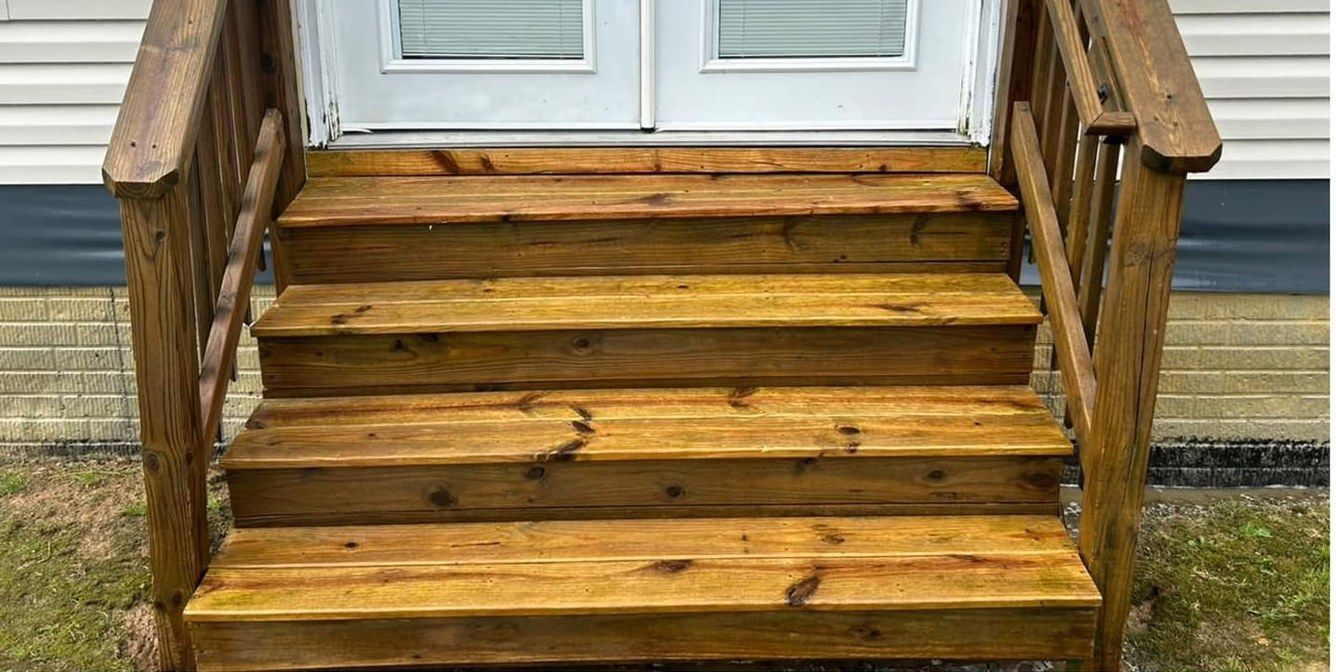 The same wooden steps after washing, fresh golden wood